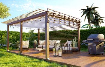 Wooden backyard deck with BBQ and furniture under wooden pergola.