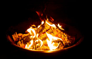 Fire Pit at night showing glowing embers